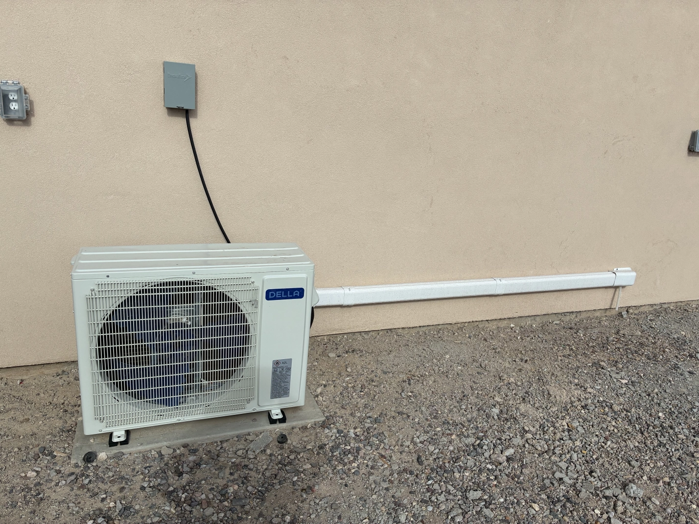 HVAC Technician working on a unit
